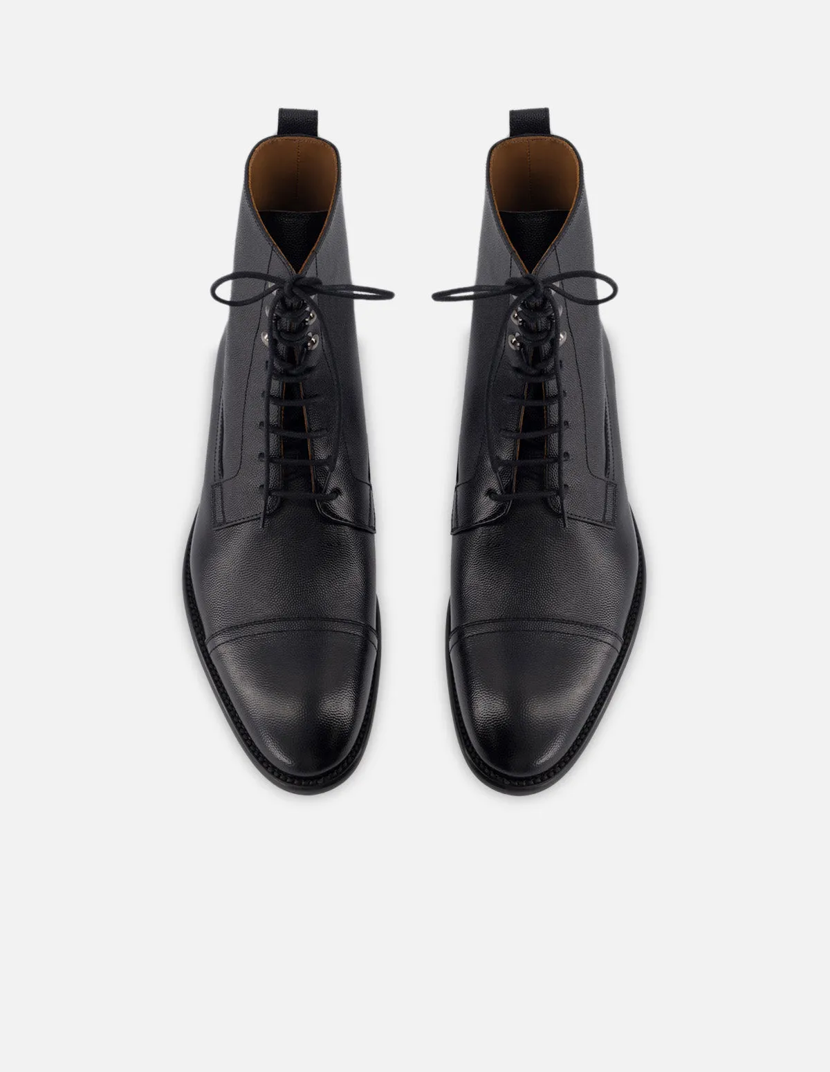 Botin de cordones en piel bombeada color negro  para hombre