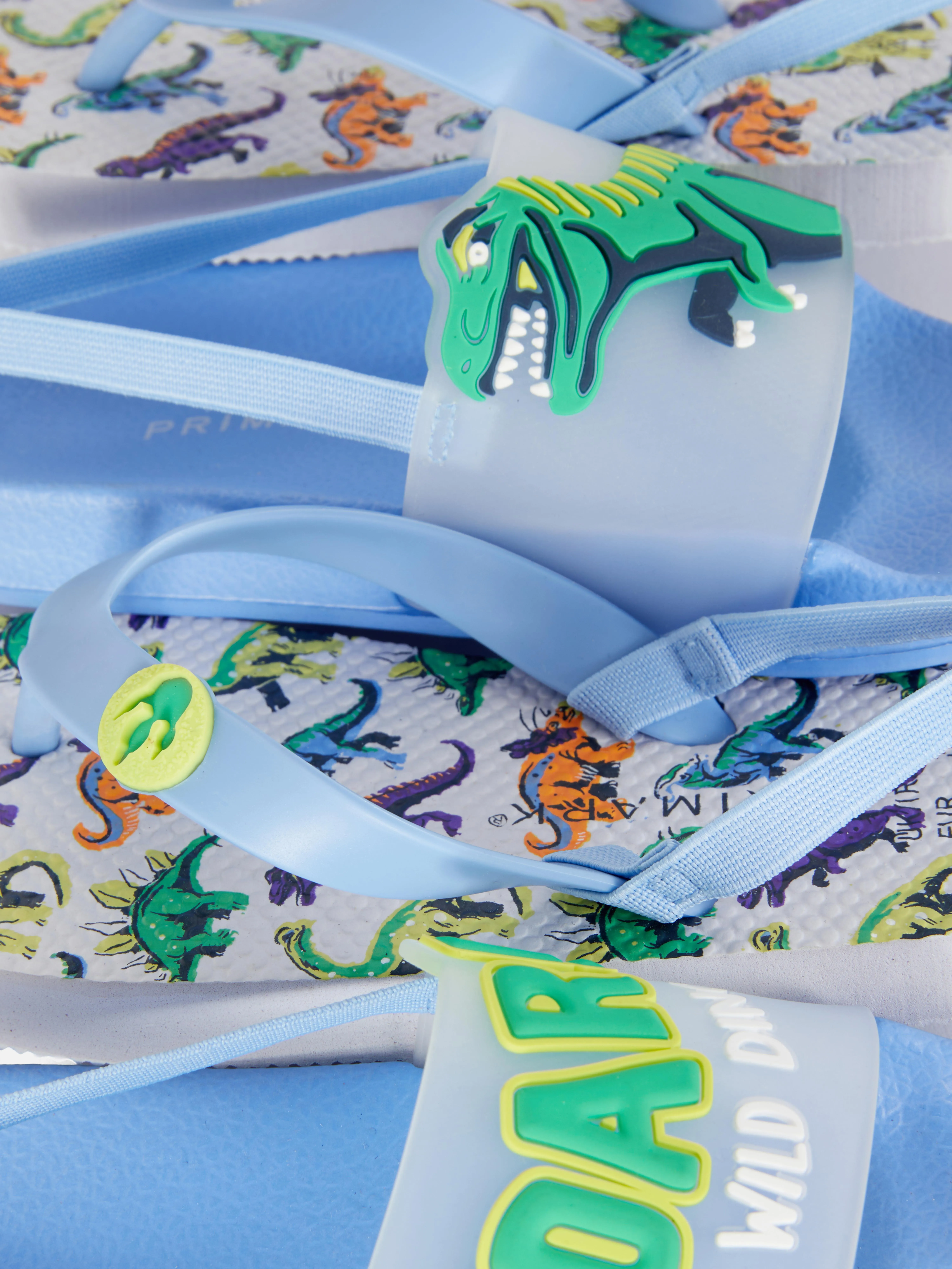 Pack de 2 chanclas con dinosaurios