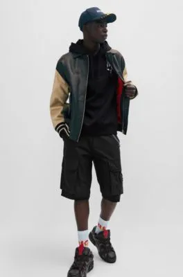Sudadera con capucha relaxed fit de felpa de rizo con gráfico de perro